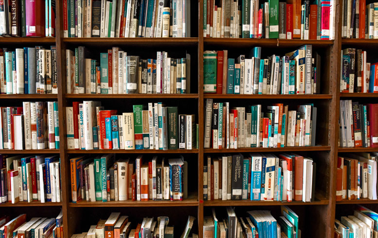 Library Shelves with Books